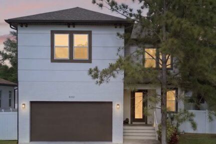 4102 S Trask — two-story home at dusk